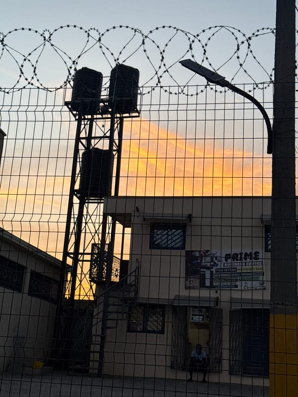 Evening street life and commerce documented in Ado, Nigeria