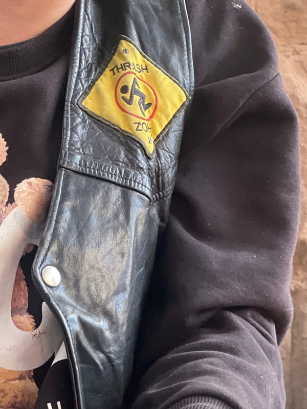 Early morning gathering at Chișinău cafe with patched jackets