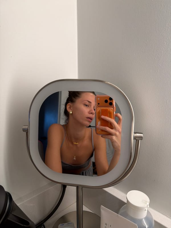 Woman takes mirror selfies in Fort Lauderdale evening