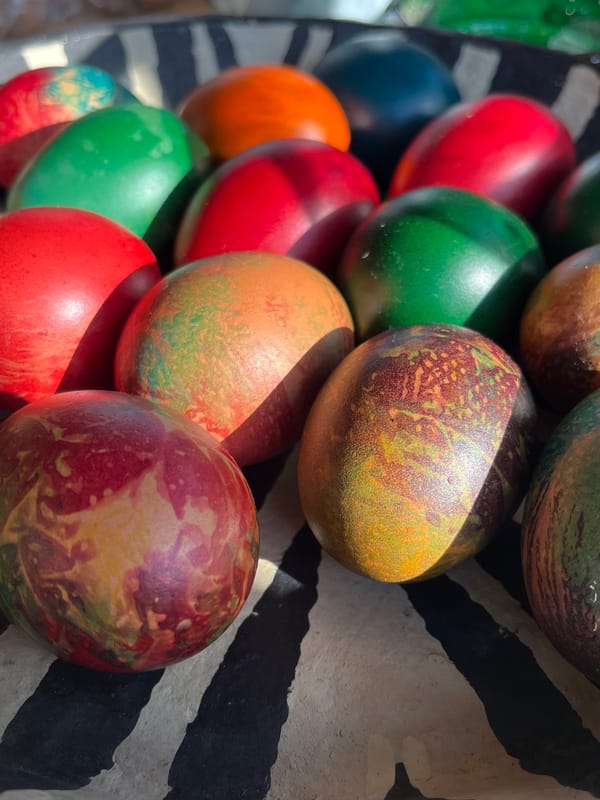 Colorful wooden ornament spheres displayed in Pchelnik, Bulgaria