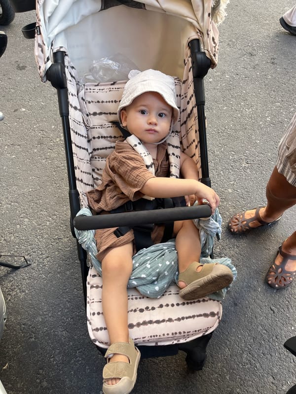 Baby in stroller spotted on Nha Trang street corner