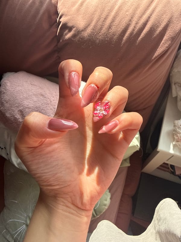 Manicured nails showcased in Kazanlak with glitter polish design