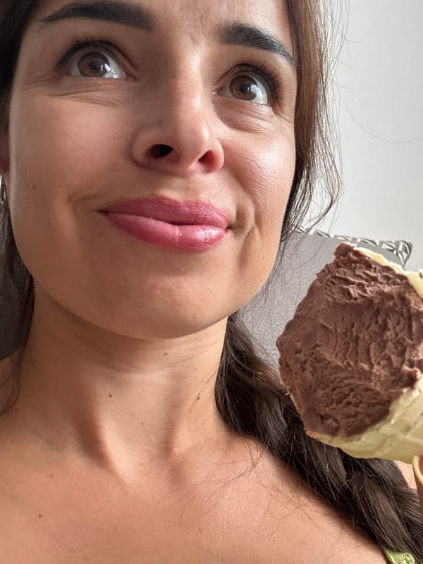 Chocolate ice cream cone, couch, somewhere with a suitcase nearby