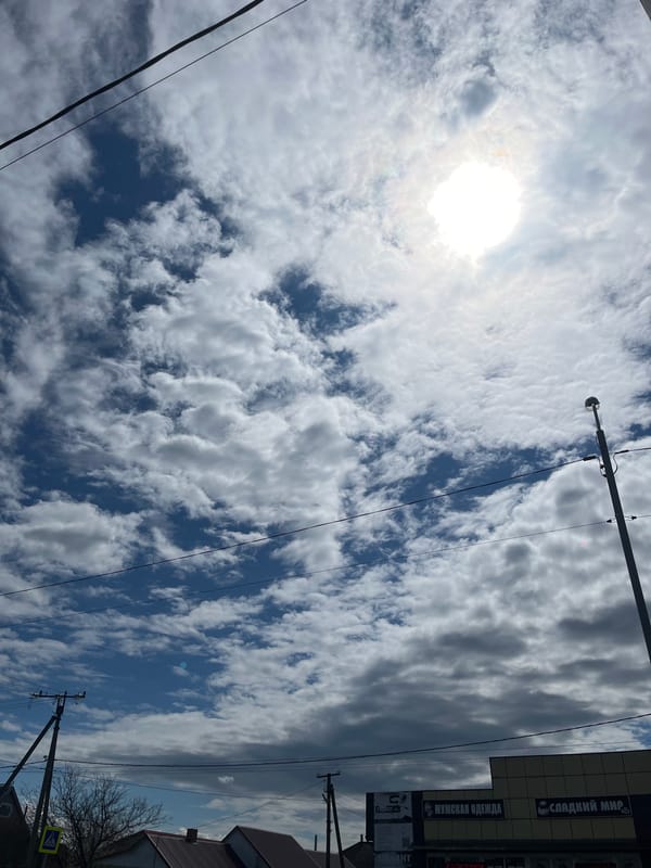 Family with stroller takes morning walk, shops in Novopokrovskaya