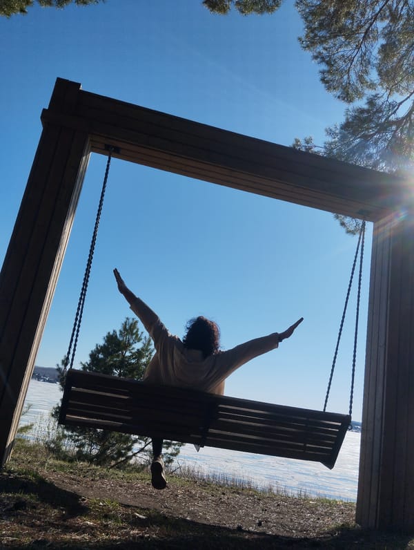 Woman enjoys lakeside leisure time in Votkinsk, Russia
