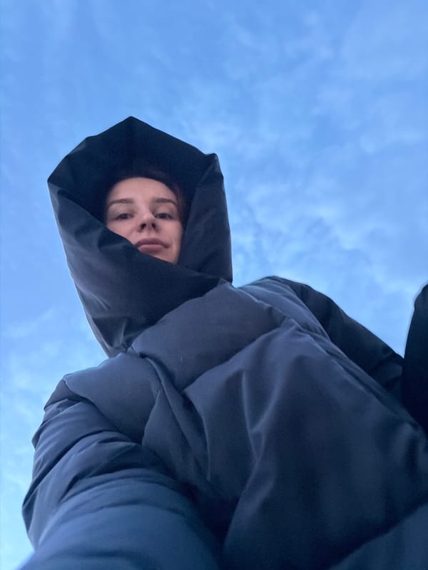 Woman walks dog, takes selfies in early morning Chaikovsky