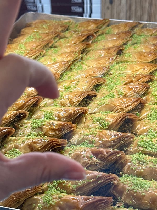Trays of baklava and kunafa at a Krefeld sweet shop