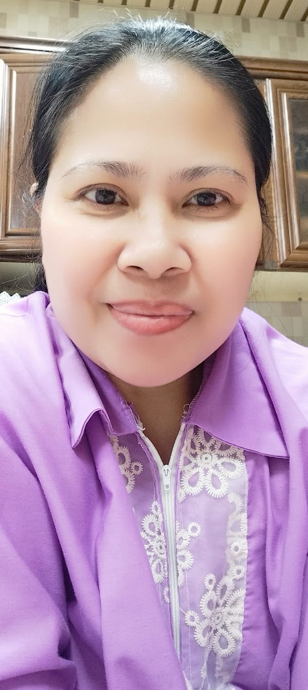 Portrait in purple shirt, two angles, one minute apart