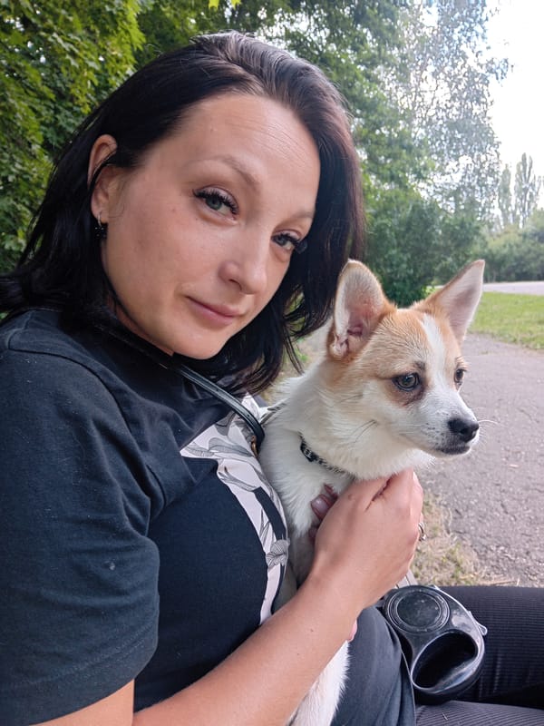 Casual summer park day in Chuhuiv: rollerblades, a dog, and flowers
