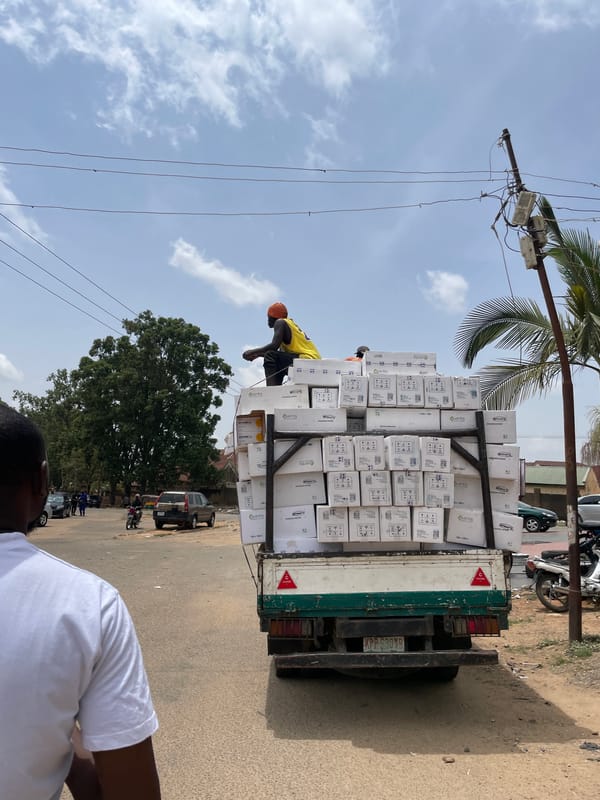Daily street life documented around Jos, Nigeria roundabout