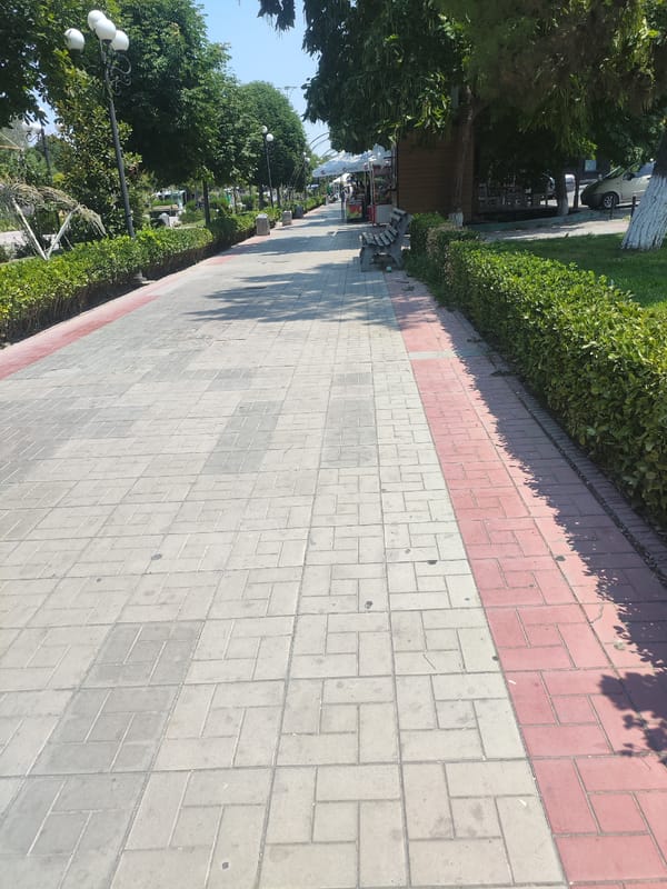 Fergana City park walkways on a quiet summer morning