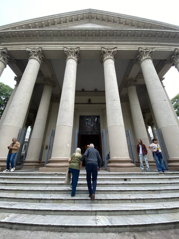 Buenos Aires cathedral and outdoor market documented simultaneously