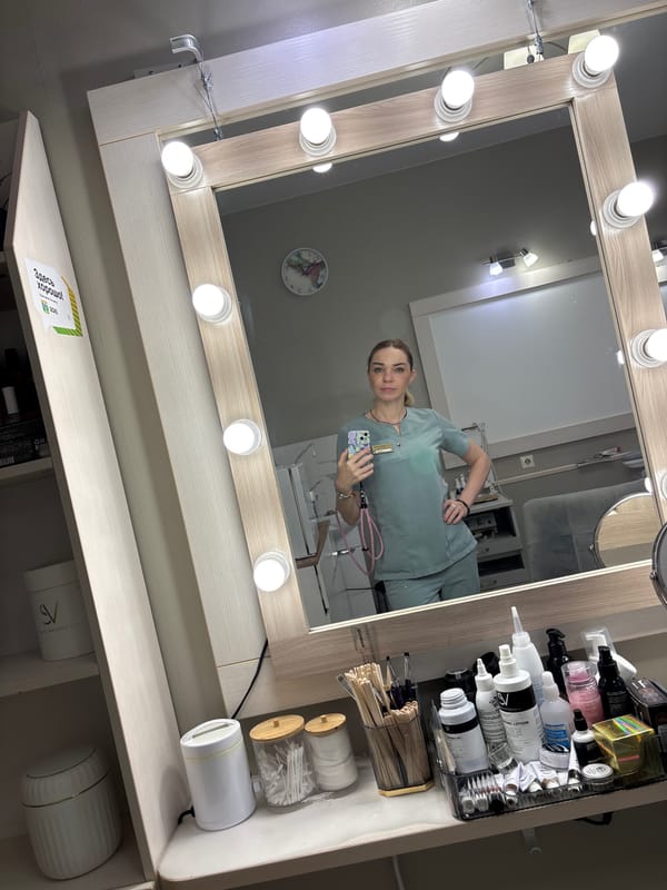 Quick selfies in scrubs at a salon or clinic near Lake Ladoga