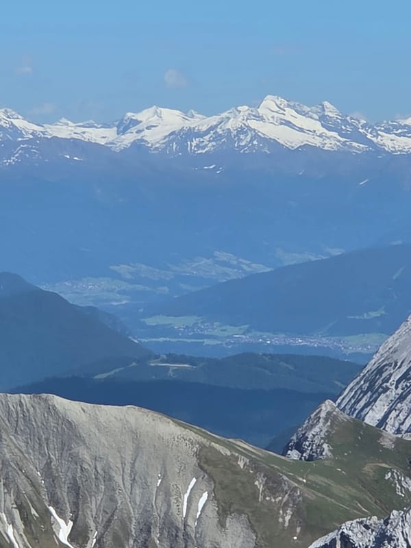 Tourist documents Zugspitze mountain views in Garmisch-Partenkirchen