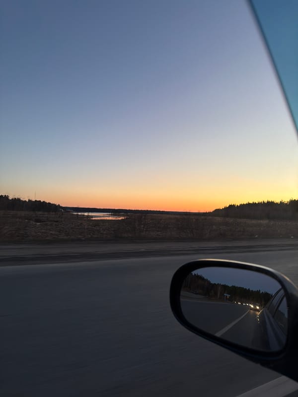 Sunset captured from vehicle on highway near Izhevsk, Russia