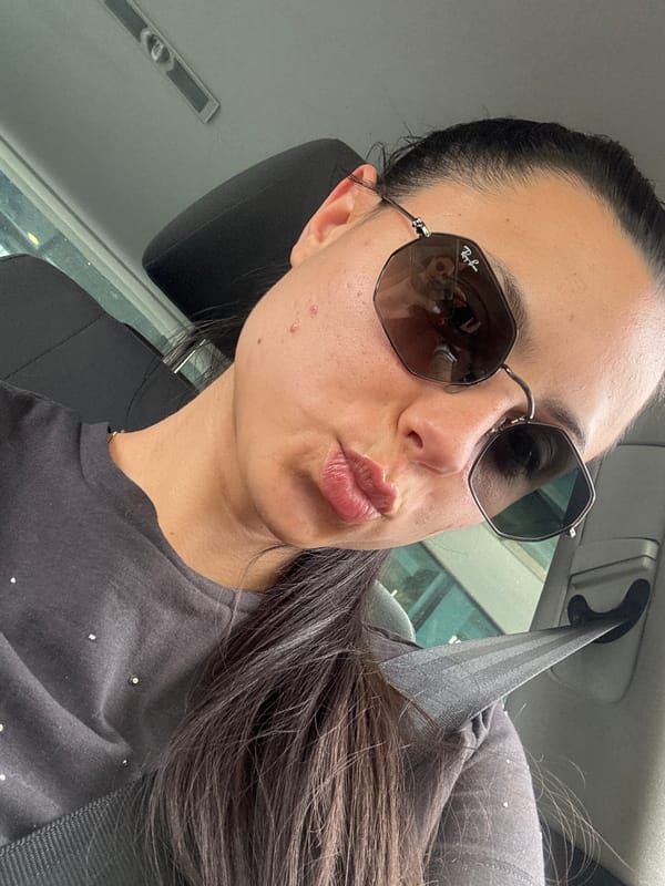 Woman photographed in car driver's seat in Sliven, Bulgaria