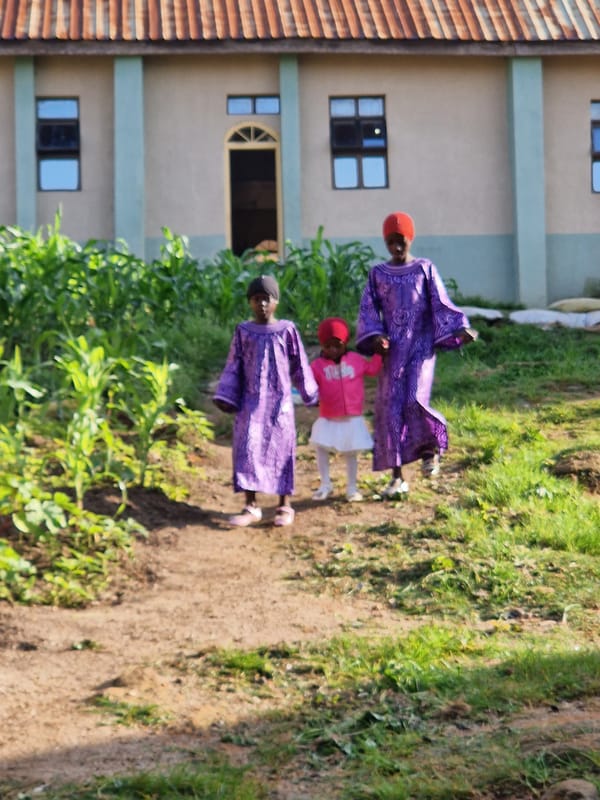 Morning street life along the dirt roads of Jos, Nigeria