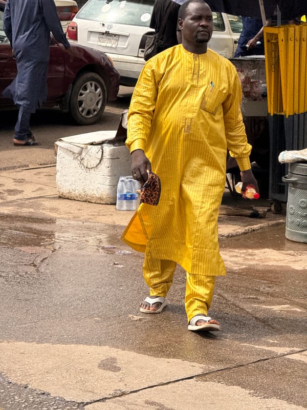 Morning foot traffic along Abuja's streets and sidewalks