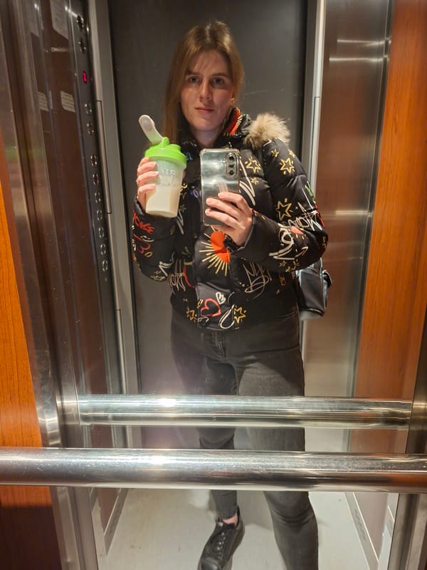 Indoor moments captured in Sofia: elevator selfie, resting ferret