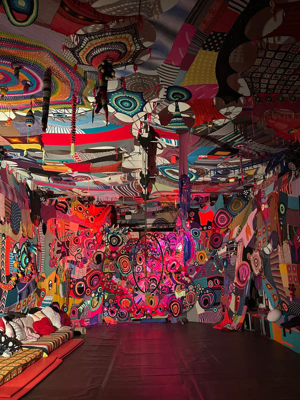 Colorful textile art installation documented in Berlin interior space