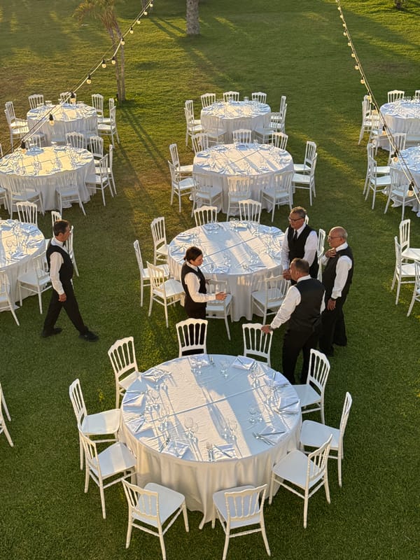 Sunset event setup captured on Italian coastal lawn