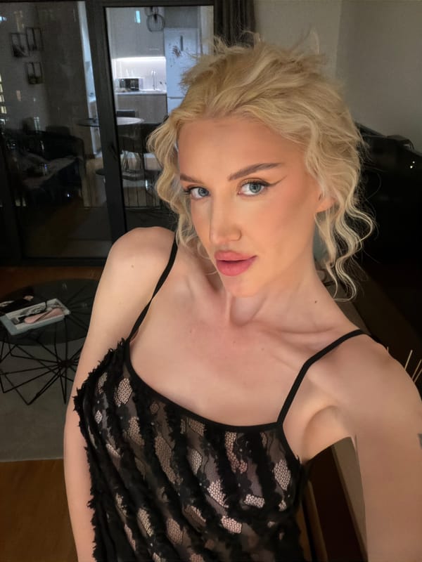 Woman documents evening selfie session with bakery food in Belgrade