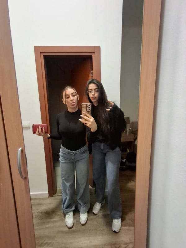 Young women take mirror selfies in Belgrade homes