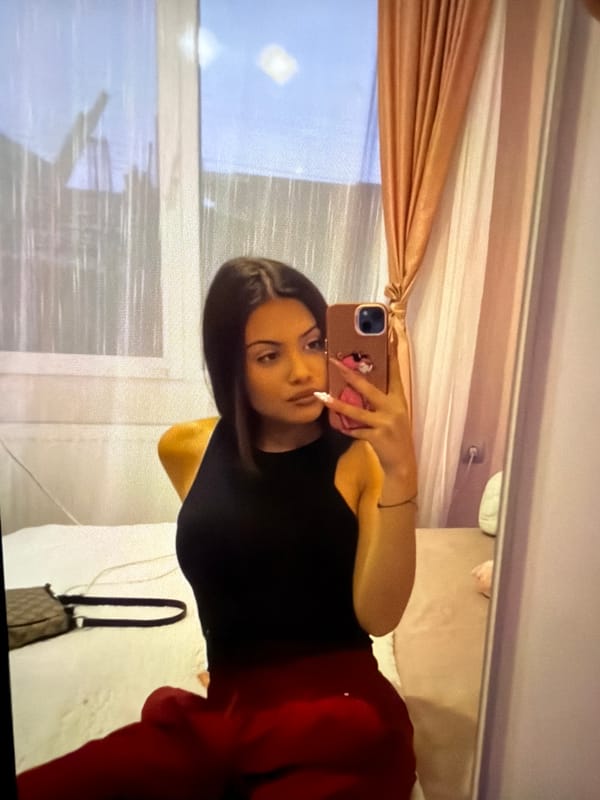 Woman takes mirror selfie in Kostinbrod, Bulgaria
