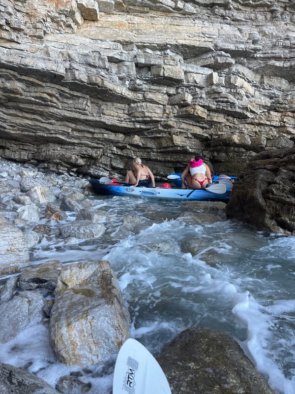 Sunny afternoon in Budva: coastline, kayaks, and street life