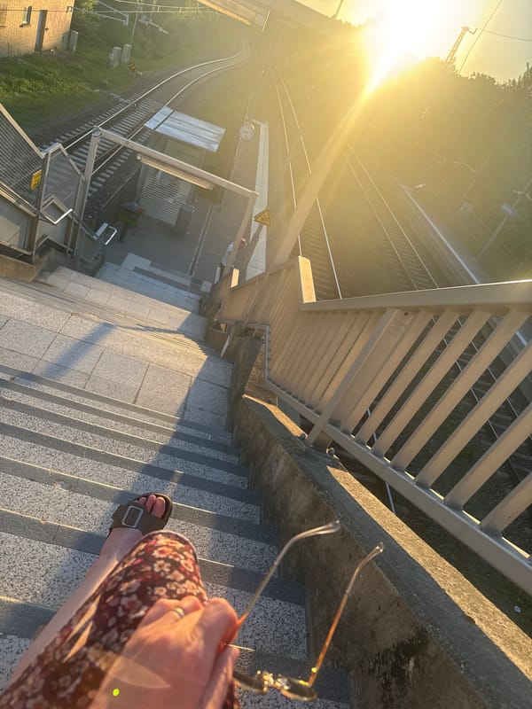 Passenger descends to railway platform in Bad Belzig station