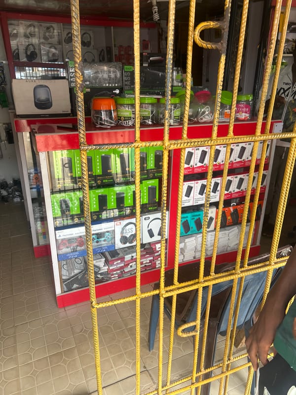 Electronics shops and street life in Ogbomosho's commercial district