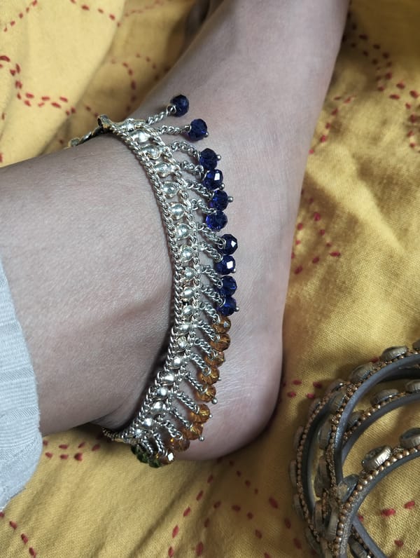 Traditional jewelry displayed on fabric in Dhaka, Bangladesh