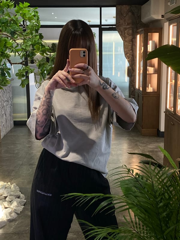 Person takes multiple selfies indoors in Votkinsk, Russia