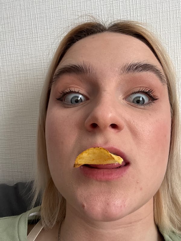 Woman photographed with potato chip between lips in Russia