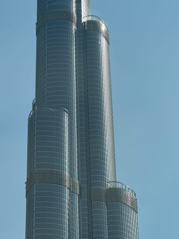 Looking up at the Burj Khalifa and Dubai's skyline