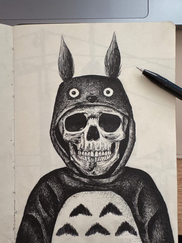 Pen-and-ink sketching session: skulls, dragons, and florals