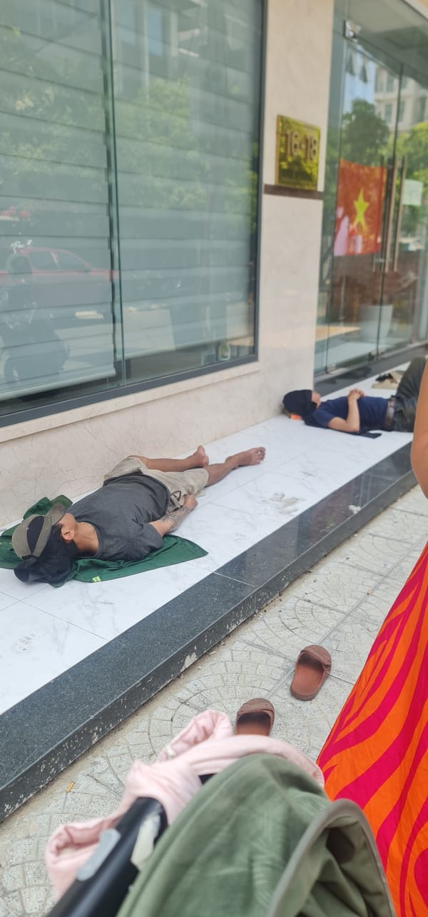 Marble sculptures displayed on Đà Nẵng sidewalk