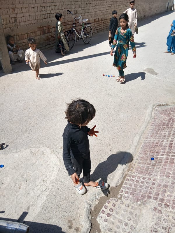 Children play in streets of Quetta during early morning