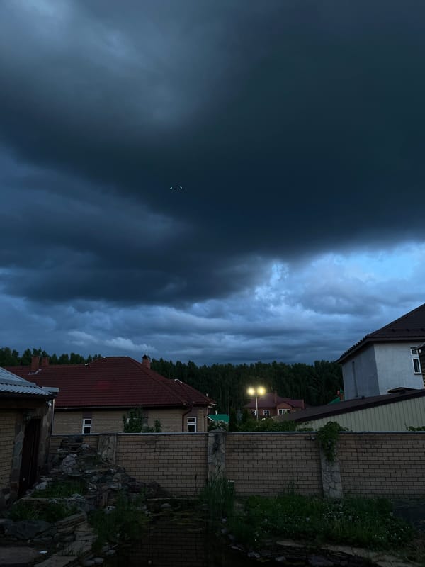 Storm clouds gather over Orekhova, Russia at dusk
