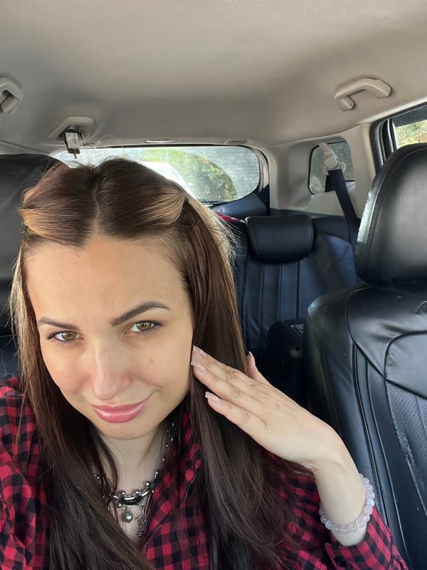 Woman photographed multiple times inside car during early morning