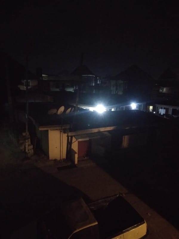 Nighttime alleyway documented in Onitsha, Nigeria