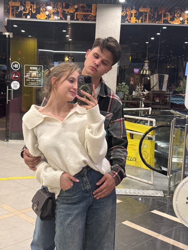 Couple visits anime café featuring Stitch figurines and K-pop displays