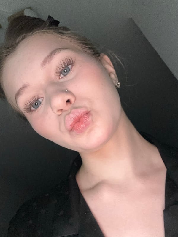 Woman takes selfies in Yekaterinburg early morning