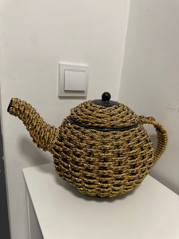 Afternoon in Sofia with handcrafted teapot and balcony plants