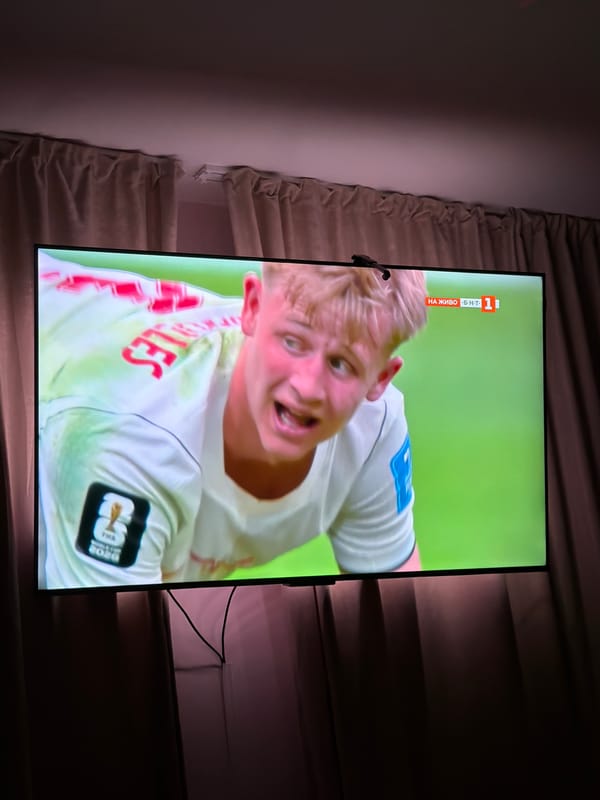 Switzerland vs. Canada match playing on a living room TV in Pleven