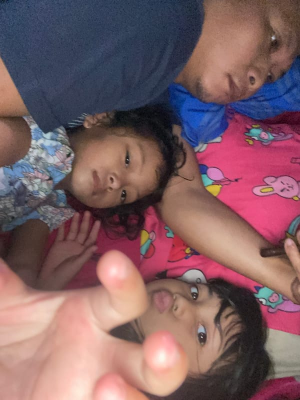 Family co-sleeping moment captured in Gelam, Indonesia