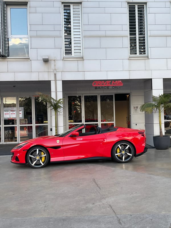 Street runners, Ferrari, motorcycle spotted in Barcelona intersection
