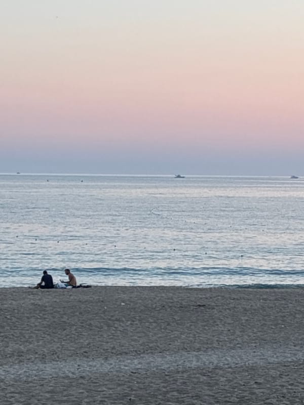 Tourist captures sunset evening scenes across Alanya, Turkey waterfront