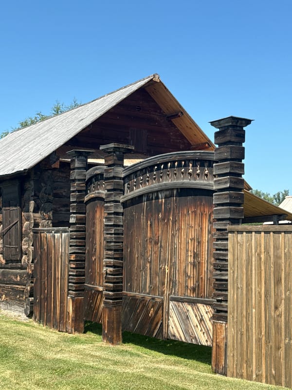 Inside a rustic wooden heritage site in Shushenskoye, Russia