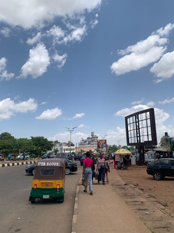 Midday street life documented across Jos, Nigeria commercial districts